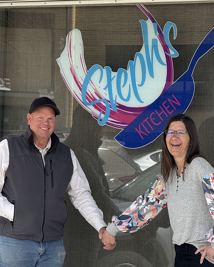 Steph and Christ Hall in front of Steph's Kitchen in Cody, Wyoming