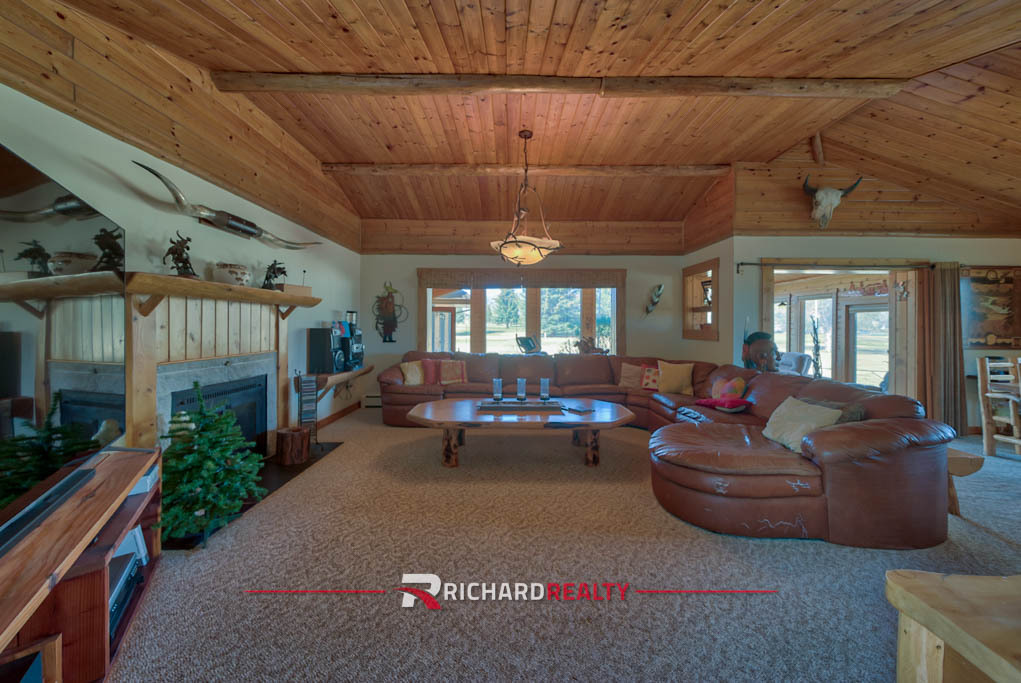 Photo 5 Property of the Week - 5 Driver Club | Living room opens to the sunroom
